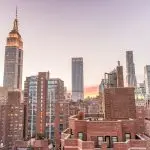 Glasschilderij 120x80cm Empire state building en omgeving